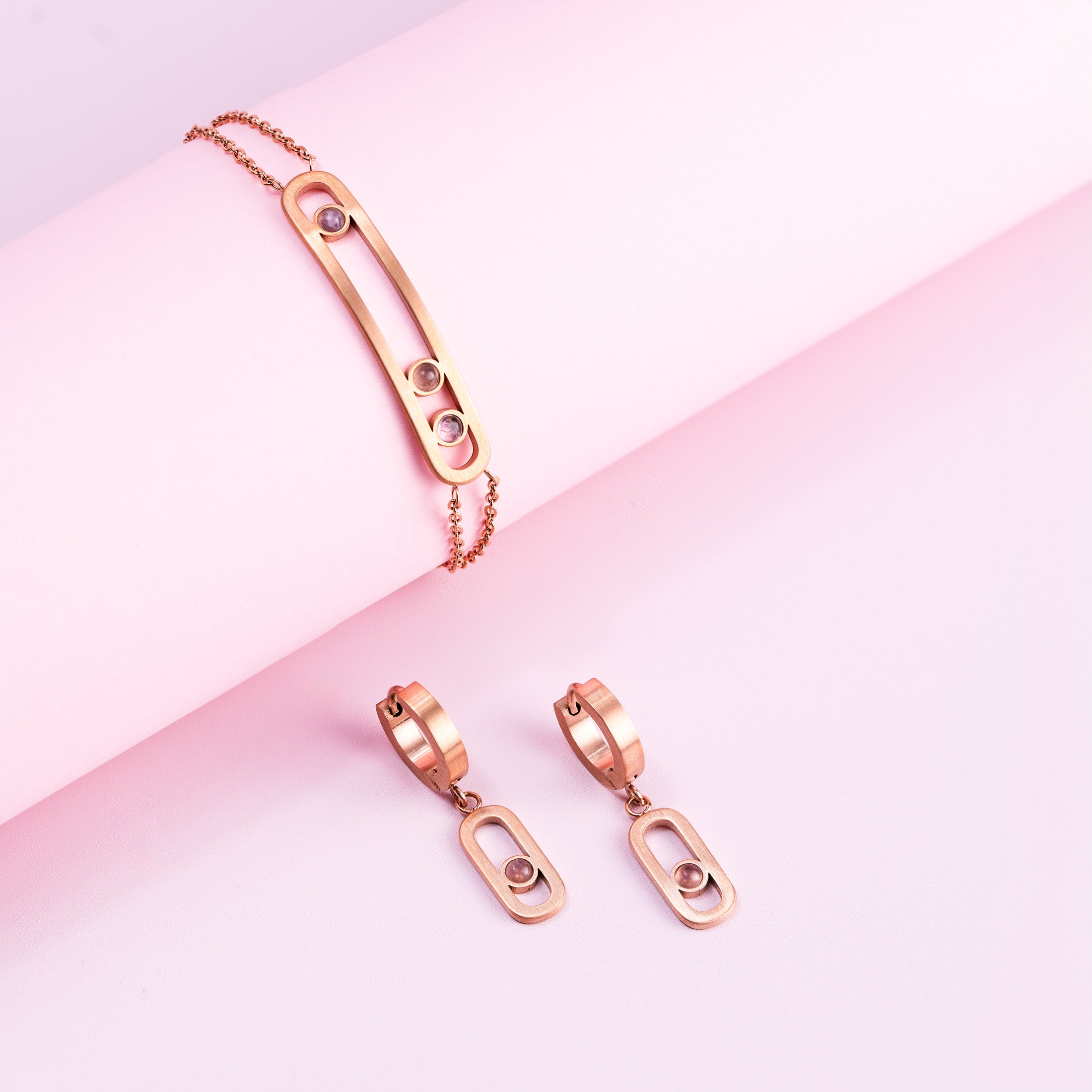Bracelet and earrings in rose gold with purple amethyst