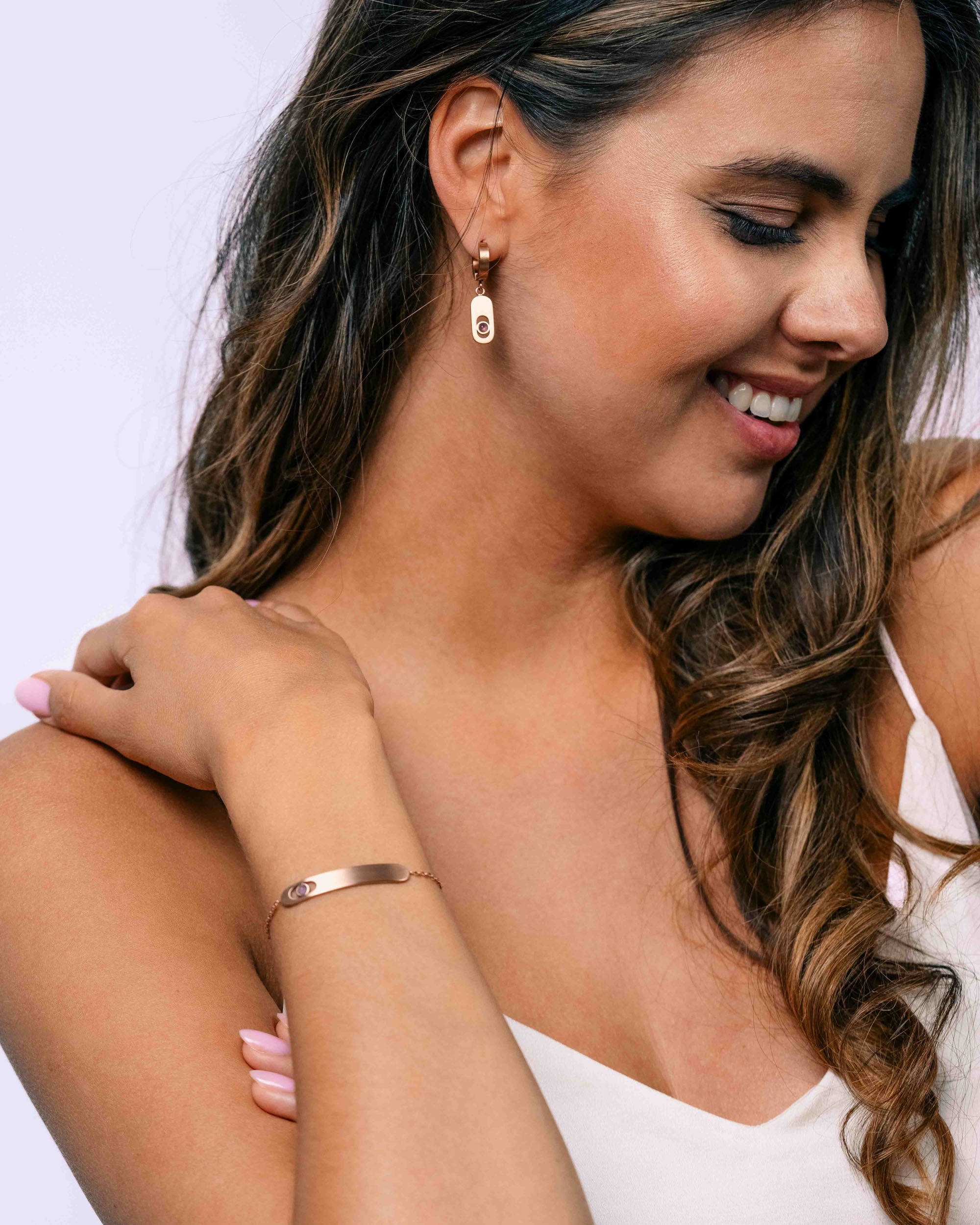 Bracelet and earrings in rose gold with purple amethyst