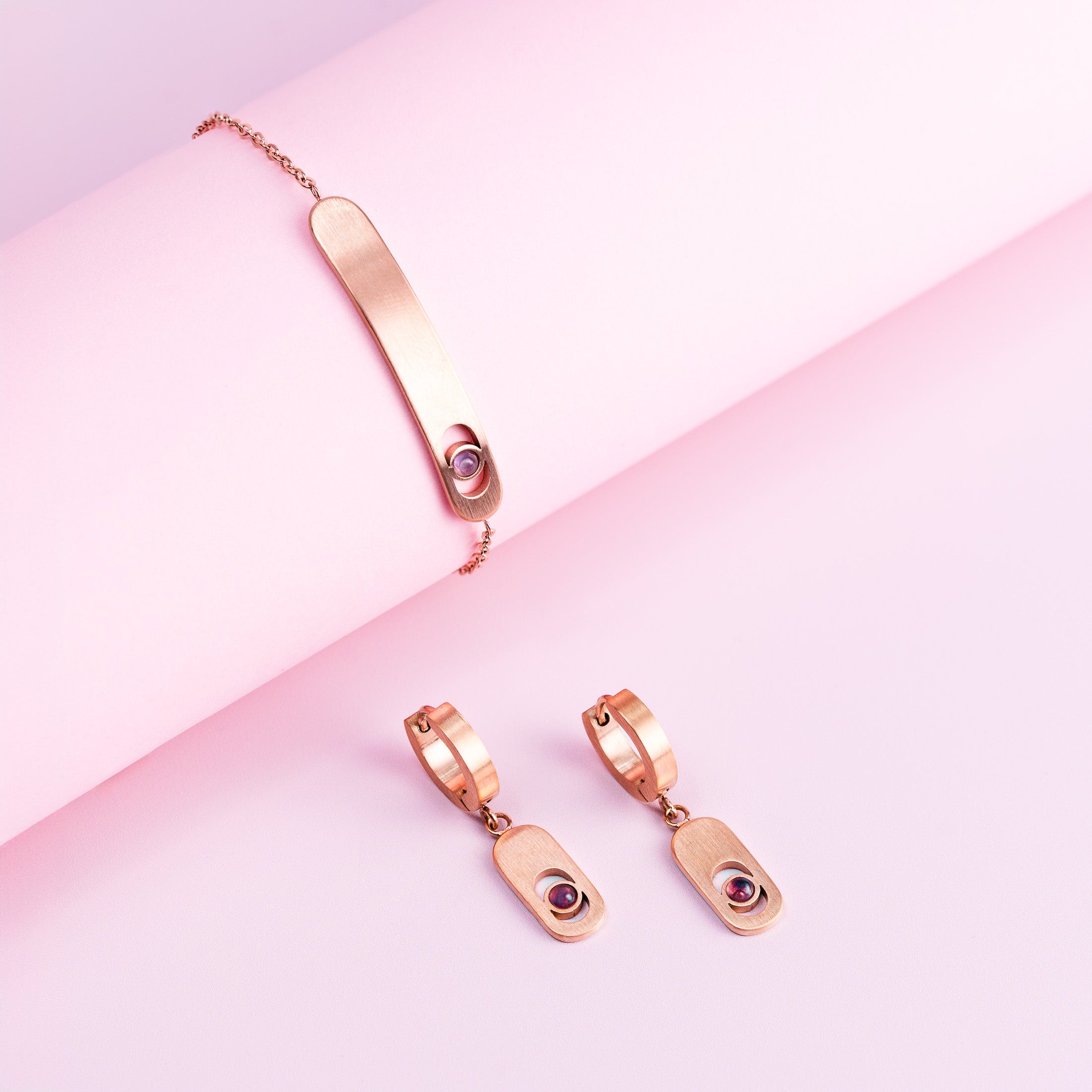 Bracelet and earrings in rose gold with purple amethyst