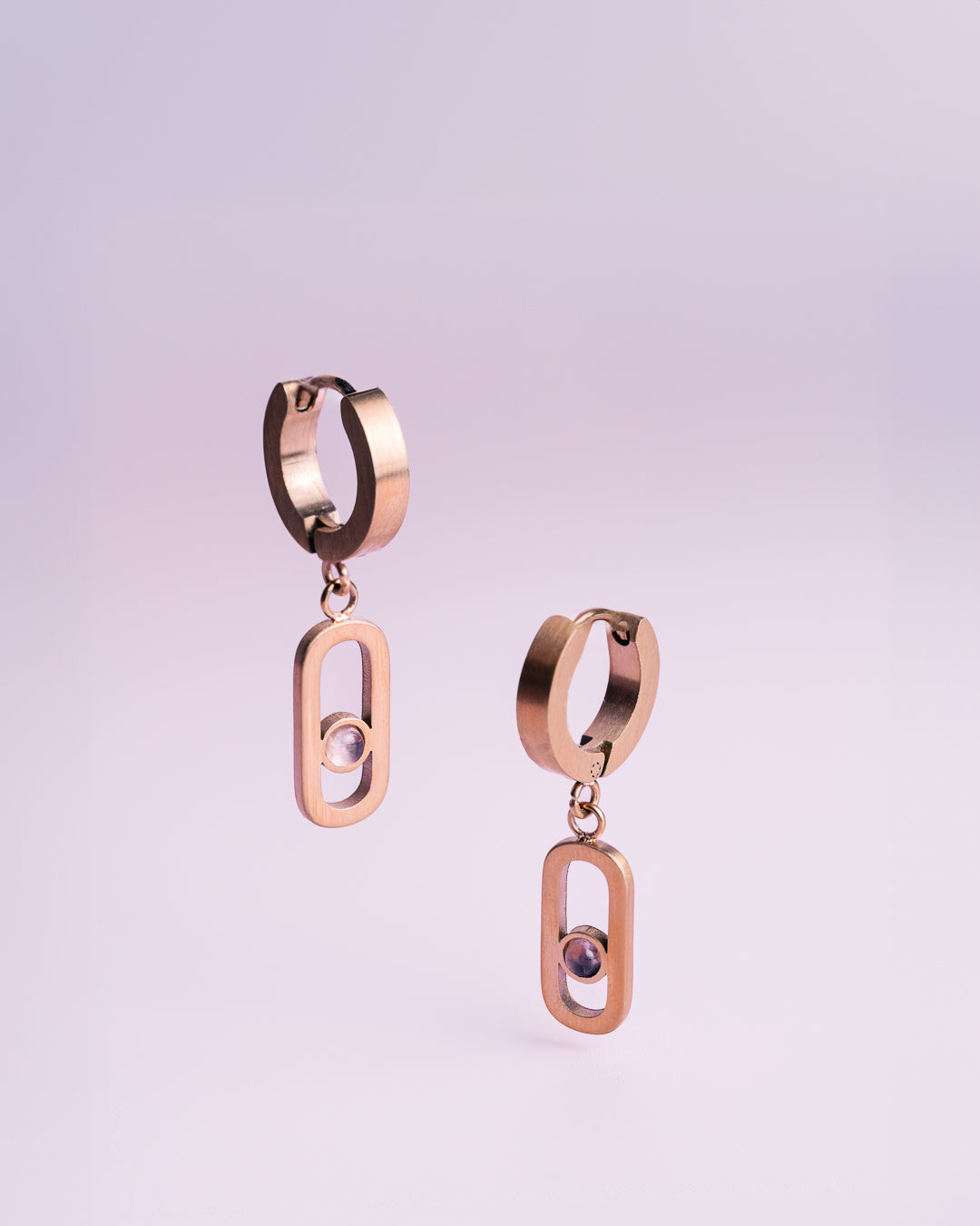 Bracelet and earrings in rose gold with purple amethyst
