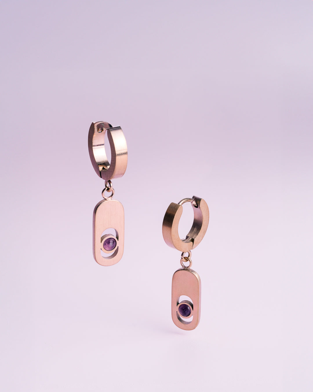 Bracelet and earrings in rose gold with purple amethyst