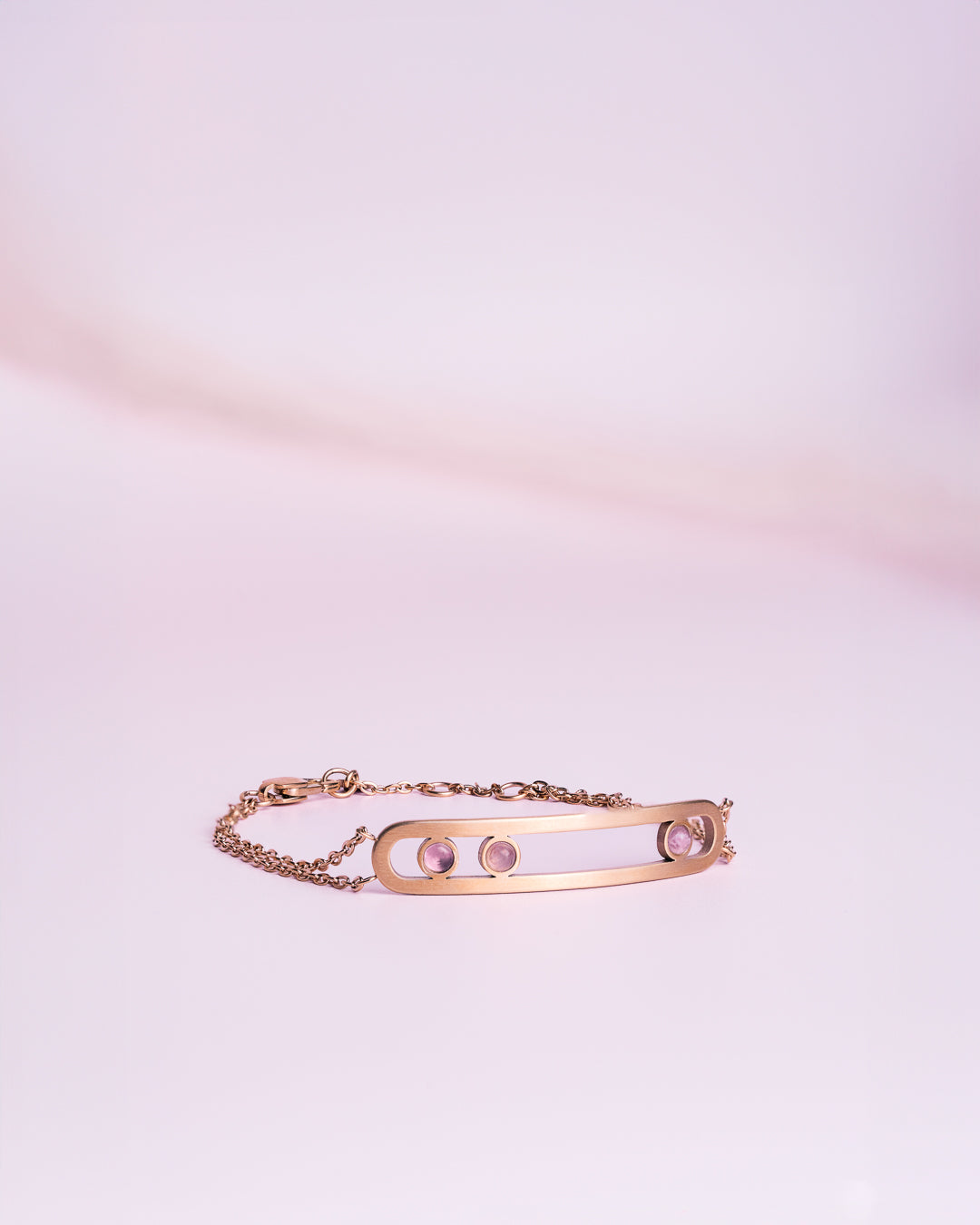 Bracelet and earrings in rose gold with purple amethyst